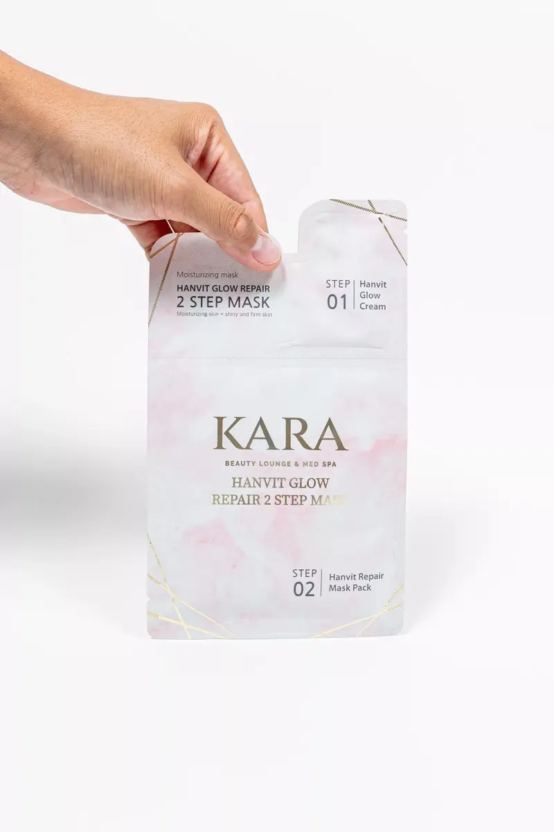 KARA Hanvit Glow Repair Mask held in hand